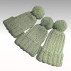 Handknitted hat with pom pom for children