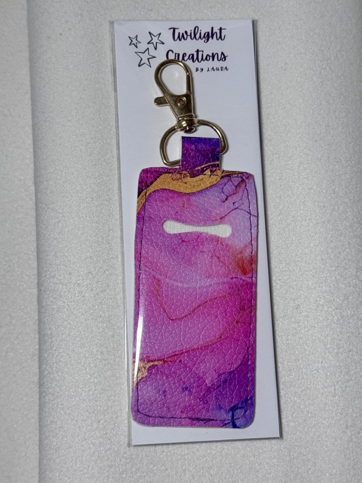 Purple/pink swirl print lipgloss holder