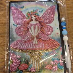 Fairy on toadstool notebook and pen bundle