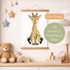 The print of the giraffe hanging on a wall in a child's room, with some words that say the giraffe is hand drawn and you add your baby's footprints to the image.
