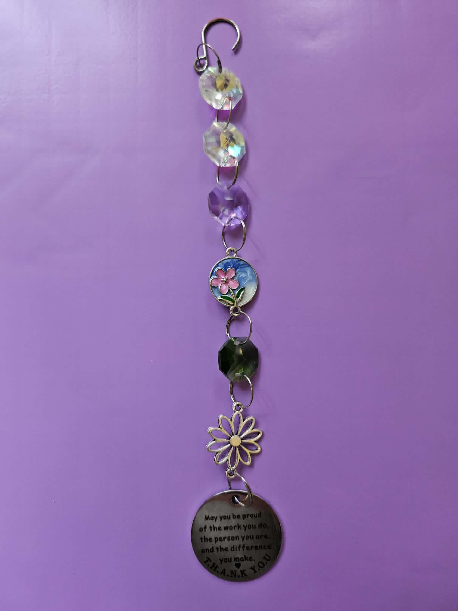 Medium suncatcher approx 20 cms inspirational with flowers blue purple pink